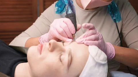 Permanent makeup. Permanent tattooing of eyebrows. Video stock 149007680