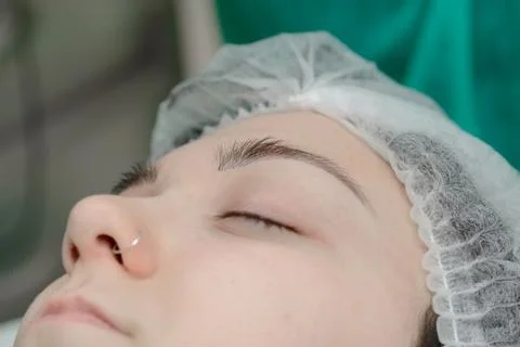 Permanent makeup. Permanent tattooing of eyebrows Stock Photos