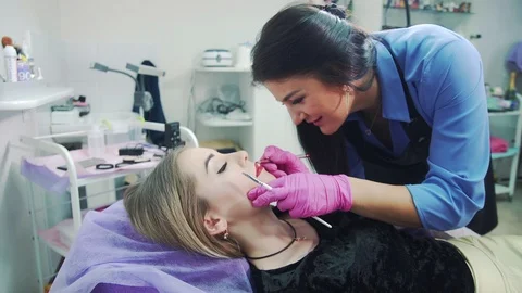 Permanent makeup procedure. Stock Footage 127514071