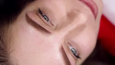 Permanent makeup procedure, performing PMU of eyebrows Stock Footage 265858965