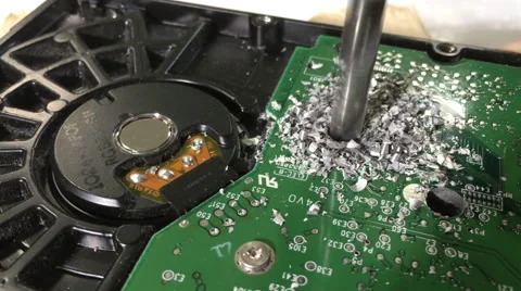 Permanently breaking hard disk drive by drilling through Stock Footage 59520784