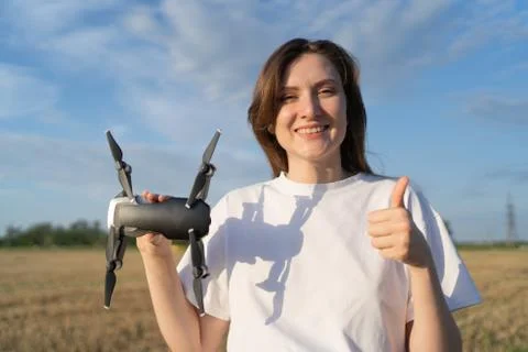 Permission to fly a drone. The operator of the quadcopter shows the like and the Stock Photos