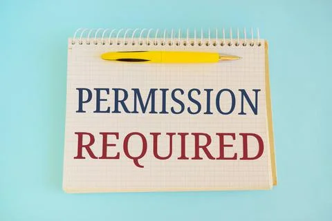 Permission Required text written on a notebook with pencil. Stock Photos