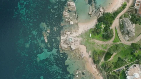 Perpendicular aerial shot of a lighthouse on a cliff Stock Footage 233928107