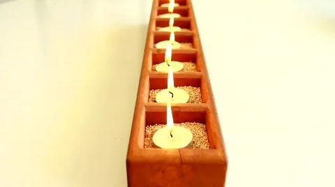 Perpendicular View of Small White Circular Candles in Wood Box 스톡 동영상 790326