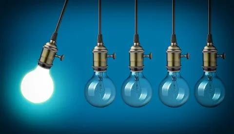 Perpetual motion with vintage light bulbs Stock Photos