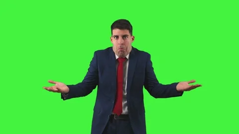 Perplex businessman as he raises his palms upwards, displaying a look confu.. Stock Footage 272835134