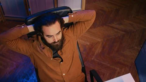 Perplexed IT admin feeling baffled by script errors, putting hands on head Stock Photos