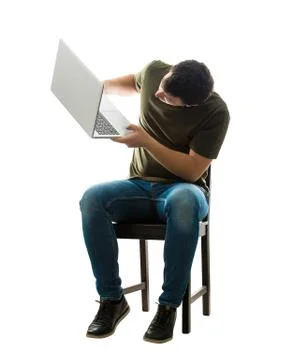 Perplexed programmer holding laptop Stock Photos