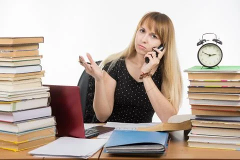 Perplexed student talking on the phone Stock Photos