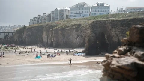 Perranporth, Cornwall, UK - 02 Sept 2024 -Holiday makers on the beach Stock Footage 283457853