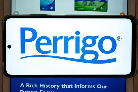 Perrigo logo displaying on smartphone screen Stock Photos