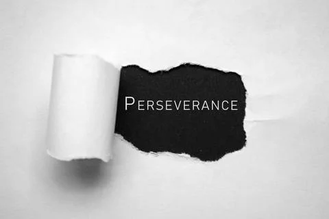 Perseverance text on white torn paper background. Powerful words Stock Photos