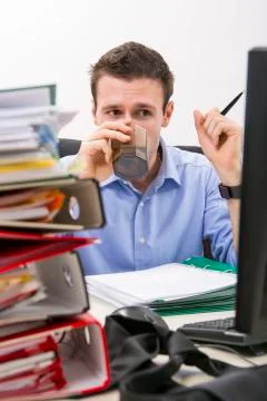 Perseverant businessman at work Stock Photos