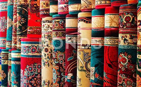 Persian blankets at a market Stock Photos