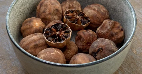 Persian dried whole lime (limu omani). Table spin. Stock Footage 277504792