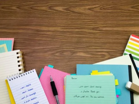 Persian; Learning New Language Writing Words on the Notebook Stock Photos