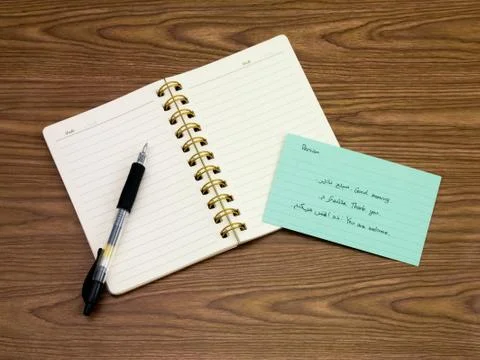 Persian; Learning New Language Writing Words on the Notebook Stock Photos