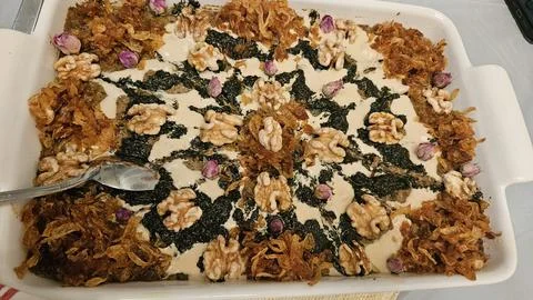 Persian Spinach Dip Garnished with Walnuts and Rose Petals Stock Photos