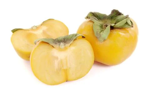 Persimmon fresh close up on background Stock Photos