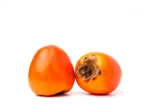 Persimmon fruit isolated on white background. Stock Photos