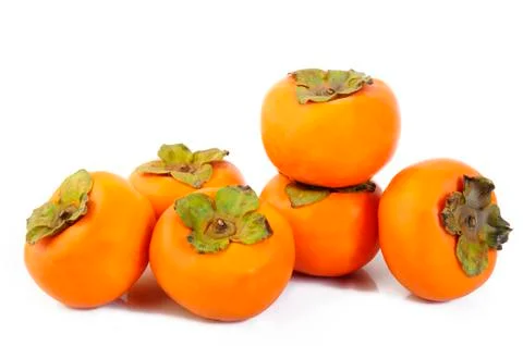 Persimmon fruit isolated on white Stock Photos