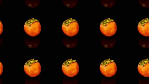 Persimmon fruit pattern on black background, 2D animation screensaver, 4K Stock Footage 166314909