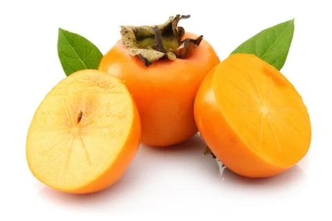 Persimmon fruit with slice and leaf isolated Stock-Fotos