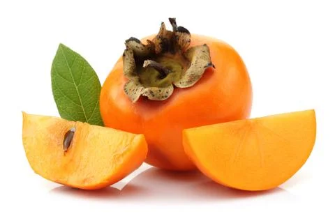Persimmon fruit with slice and leaf isolated Stock-Fotos