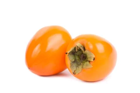 Persimmon fruit on a white background Stock Photos