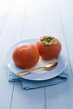 Persimmon - kaki Stock Photos