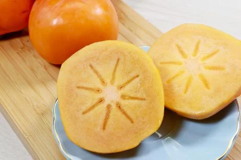 Persimmon pulp close-up Stock Photos