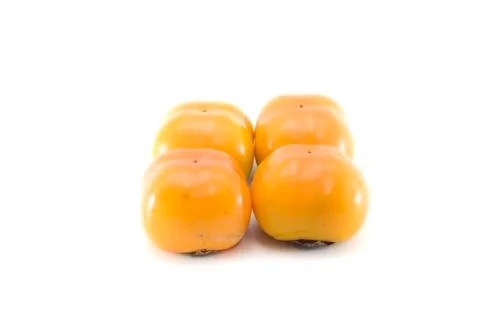 Persimmon sands on white background with isolate. Stock-Fotos