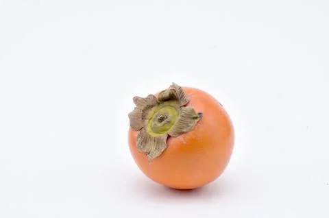 Persimmon on a white background.Natural.For Isolation. Stock Photos