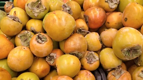 Persimmons in a box Stock-Footage 258822893