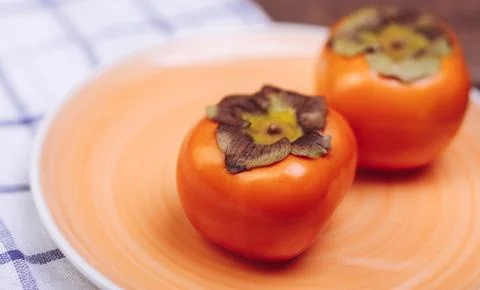Persimmons Stock Photos