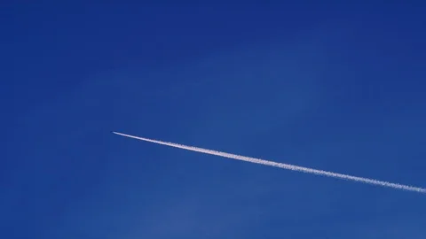 Persistant contrail laydown from airliner Stock Footage 100437583