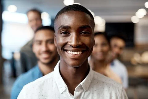 Persistence determines your ultimate position. Portrait of a group of confident Stock Photos