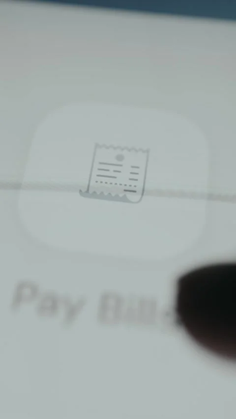 Person accessing bill payment option in mobile banking app Stock Footage 333386187