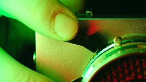 Person activating an old analog machine with a lever Stock Footage 321736580