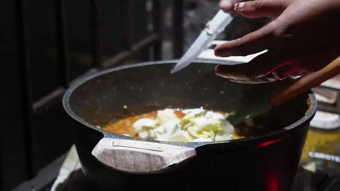Person adding chopped boiled eggs Stock-Footage 326312014