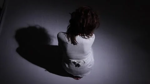 Person alone in an asylum room Stock Footage 300114481