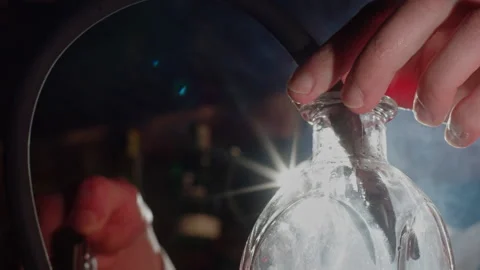 Person applying dry ice through a tube Stock Footage 255701187