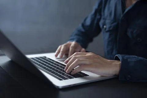 Person are using laptops, working or studying online at home. businessman usi Stock Photos