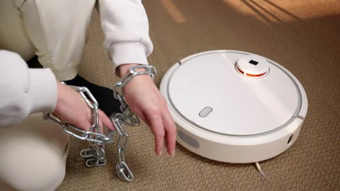 Person breaking free from chains activating a cleaner 스톡 동영상 332167717