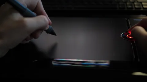 Person Browsing Web with Pen digital graphic Tablet. POV Close up Hands. Stock Footage 118335097