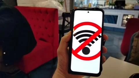 A person cannot connect to a Wi-Fi network in a public space. Stock Footage 310854901