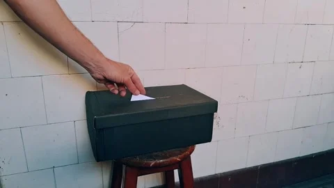 Person casting vote in ballot box during election animation footage clip Stock Footage 341626273