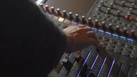 A Person Changing Controls and Moving Knobs on a Music Mixer 스톡 동영상 163701352