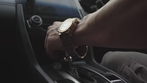 Person changing the gear of a car Stock Footage 137380947
